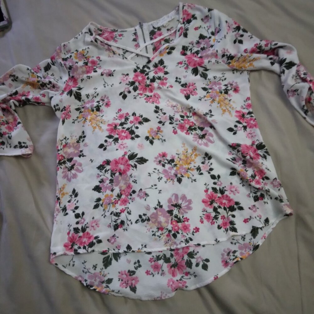 White and pink flower printed blouse.